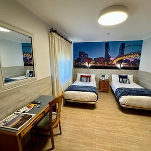Kamer met een Queen Size Bed
